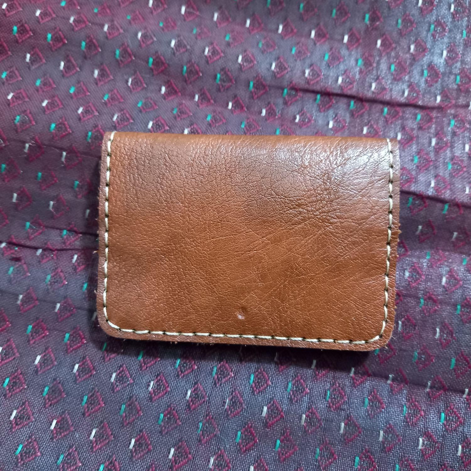 یک عدد کیف پول|کیف، کفش، کمربند|اقبالیه, |دیوار