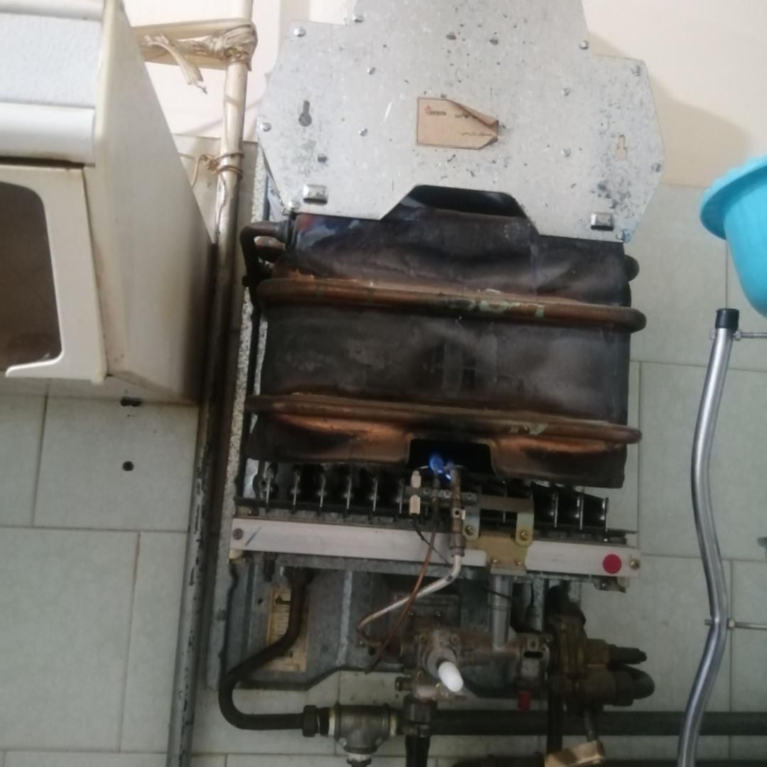 تاسیسات و خدمات فنی میرزایی|آبگرمکن، پکیج، شوفاژ|بومهن, |دیوار