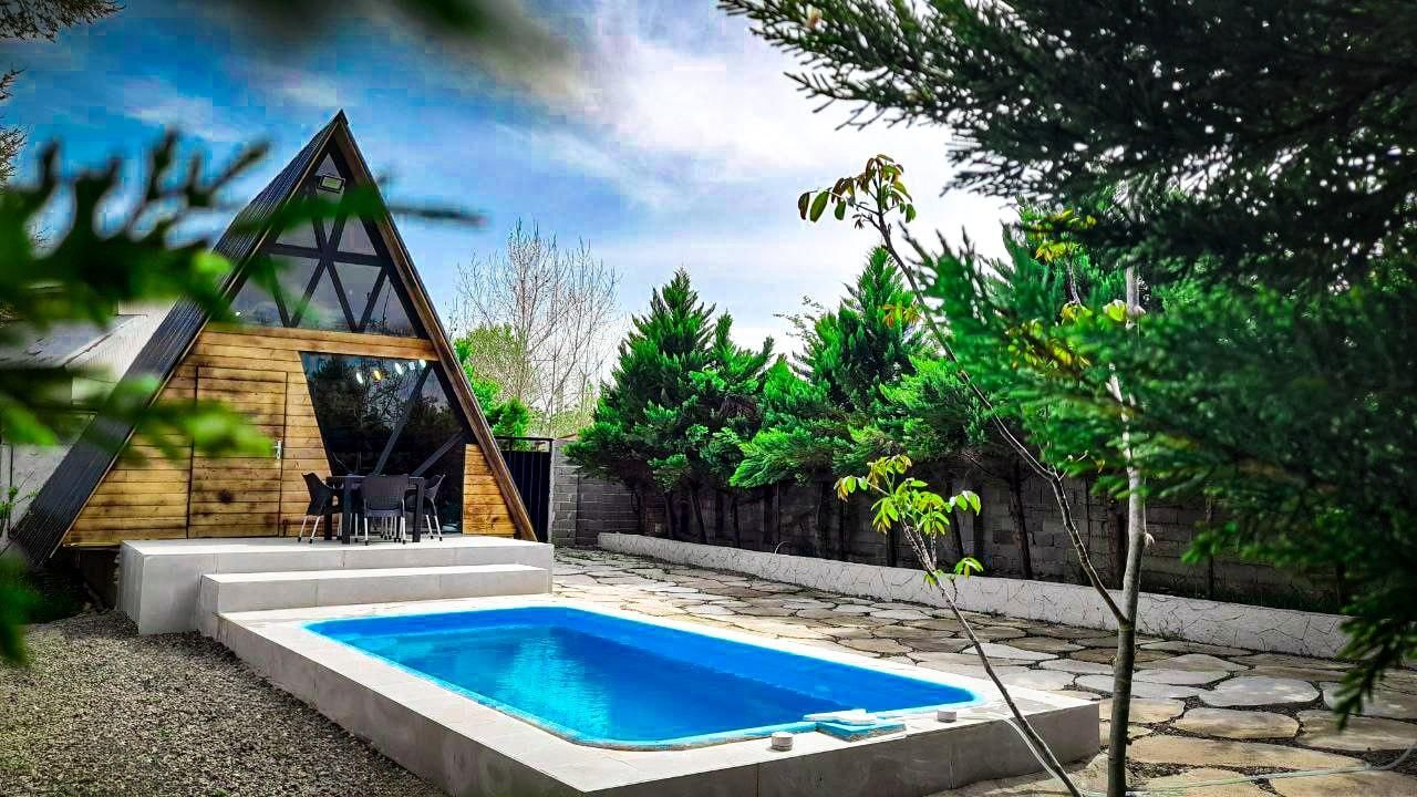 کلبه سوئیسی روستایی دربست با استخر آبگرم|اجارهٔ کوتاه‌مدت ویلا و باغ|رشت, پسیخان|دیوار