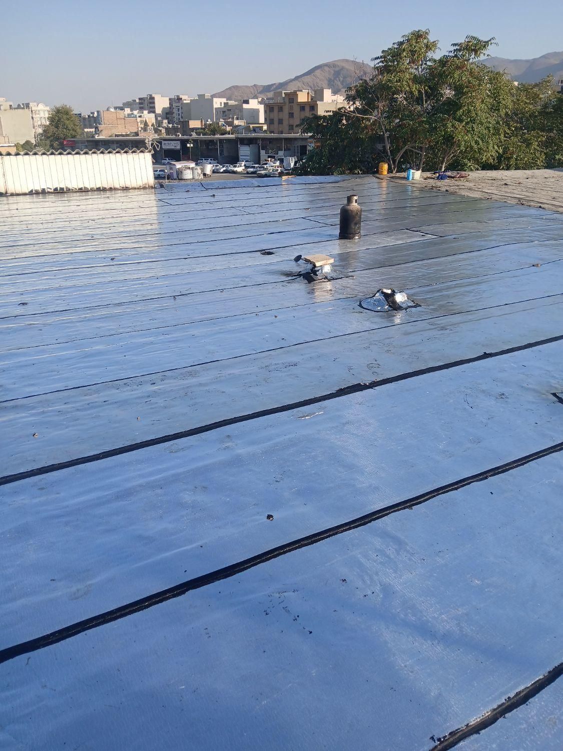 نصب ایزوگام.قیرگونی.لکه گیری.|خدمات پیشه و مهارت|اراک, |دیوار