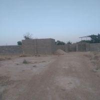 فروش-زمین-دور-دیوار-خانه-باغ-استخر-فاقد-درخت