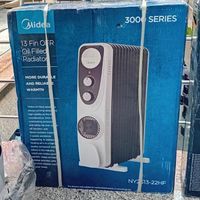 شوفاژ برقی روغنی 13 پره مدیا فندار ( Midea )|آبگرمکن، پکیج، شوفاژ|تهران, ایران|دیوار