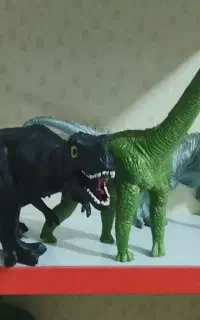 چهار عدد دایناسور پلاستیکی