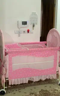 تخت گهواره نوزاد کودک تا ۶سالگی صورتی کنار مادر