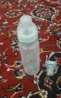 پستانک وشیشه بچه