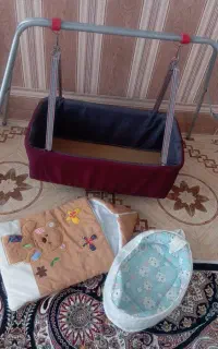 گهواره آغوشی کیسه خواب