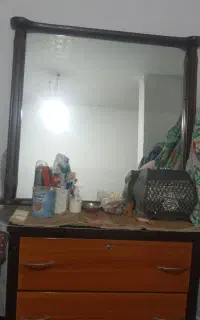 آینه دور چوب بزرگ