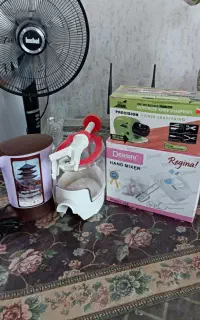 قهوه ساز برقی و هسته آلبالو گیر وچاقو تیزکن