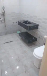 بنای بازسازی ساختمان سرامیک کاری لکه گیری گچ