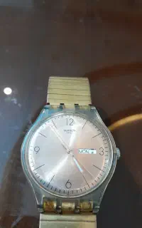 ساعتswatchاصلی