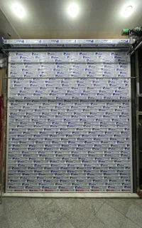 کرکره برقی و‌ دوربین مداربسته بابایی