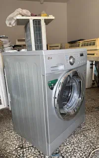 لباسشویی الجی نقره ای و سفید وسیلور اصل کره