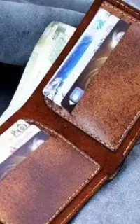 کیف پول همراه مدارک به اسم ناصر برنجکار گم شده