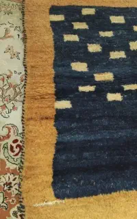 یک قالیچه یاگبه دست بافت 1در 1