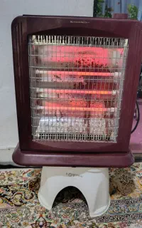 بخاری برقی سه شعله