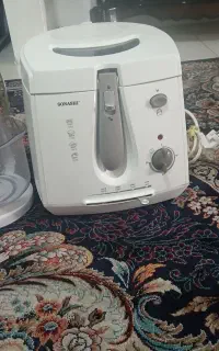 آرام پز سه کاره وسرخ کن برقی وهمزن برقی