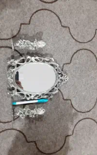آینه و شمعدانه فلزی سیاه قلم