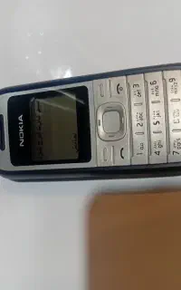 موبایل ۱۲۰۰ و تاچ ال سی دی و باطری