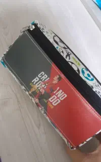 جامدادی نو دو زیب طرح فوتبالی رونالدو فروش می رود.