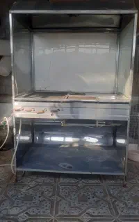 یک دستگاه جوجه گردان و یک فر چهار کاره