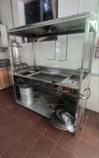 یک دستگاه گریل ساندویچ سه کاره و یک کولر ابی ۶۰۰۰