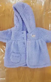 یک عدد لباس گرم نوزادی دخترانه