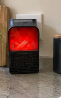 هیتر برقی پریزیFlameHeater1000وات طرح شومینه