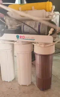 ویتنام اصل دستگاه تصفیه آب RO با فیلتر نو و مخزن