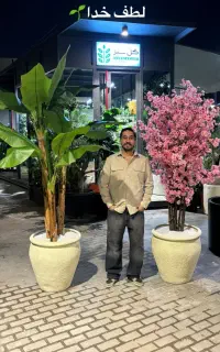 فروش گل های مصنوعی قم درختچه های دکوری گلدان چوبی