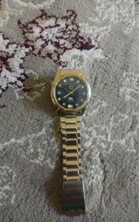 ساعت کوکی قدیمی طلایی