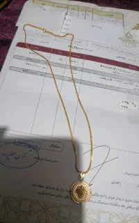 زنجیر و مدال طلا