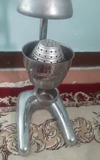 یک دستگاه اب مرکبات گیر استیل اصل.