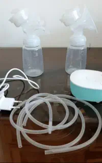 شیردوش برقی نوزاد