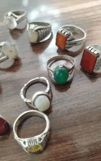 دوازده عدد انگشتر نقره و شارژر آیفون اصلی