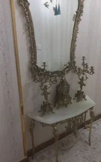 اینه شمعدان ساعت