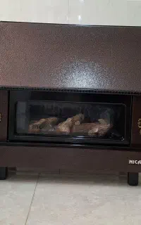 بخاری گازی شومینه نیک کالا