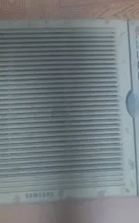 درب کلر گازی پشت پنجره‌ای سامسونگی