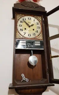 ساعت دیواری کوکی کره ای