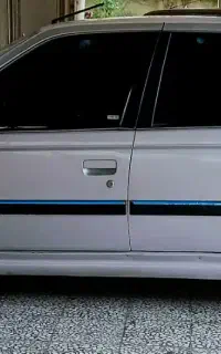 پرده و میز تلوزیون و پژو پارس