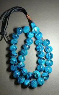 تسبیح کهربا 161گرم شیشه‌ای