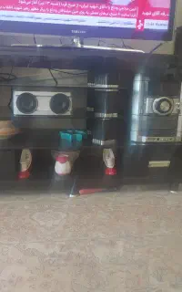 میز تلویزیون شیشه ای