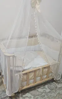 تخت نوزاد، کنار مادر