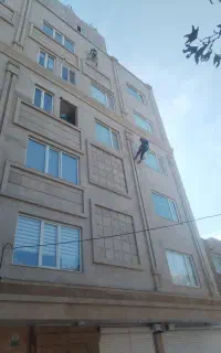 کار در ارتفاع  راپل پیچ و رولپلاک شستو شوی نما