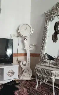 ست آینه و ساعت و زیر تلویزیون