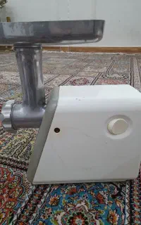 آبمیوه گیروچرخ گوشت