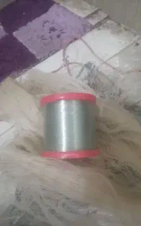 سلیه و قرقره نخ