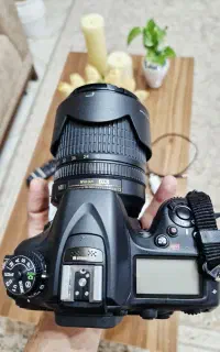 دوربین نیکون d7100 با لنز 18.140