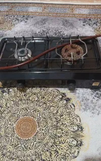 اجاق گاز 2شعله رومیزی پولاد.کارکرده سالم وتمیز