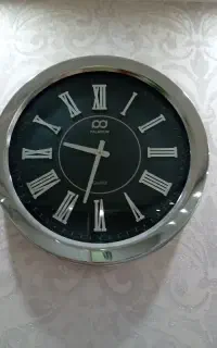 ساعت قاب استیل وتابلوپلی استر