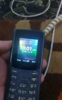 گوشی نوکیا دوسیم کارت ومعماری خور